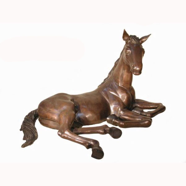 Bronze Foal laying down