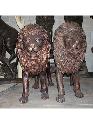 Pair of Bronze Walking Lions
