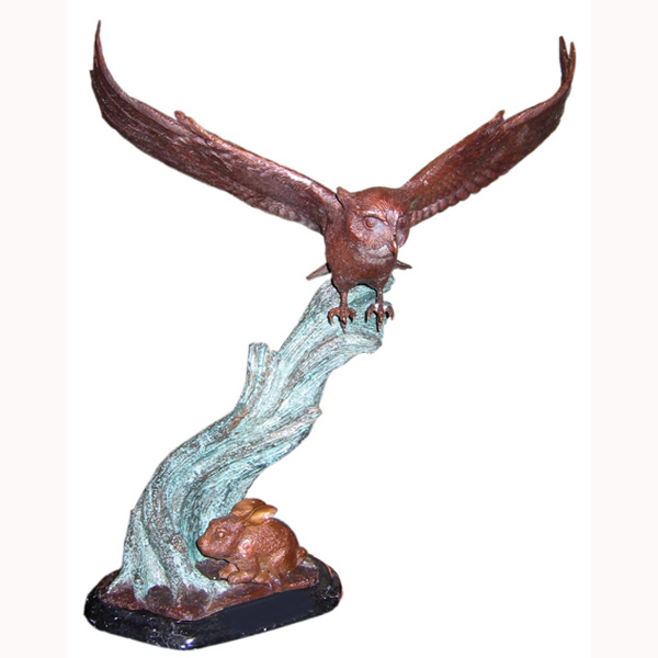 Bronze Owl Flying